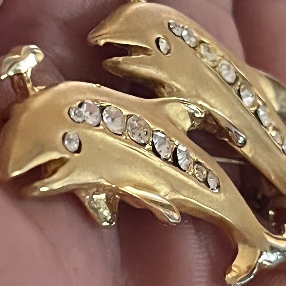 Dolphin gold and rhinestone brooch